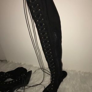 Thigh high laced heels